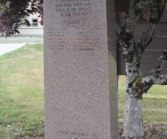 <p>Photo Christi Baron</p>
                                <p>The monument at Forks City Hall honors the memory of fourteen West End servicemen who gave their lives in service to our country. Their names—Walter Fletcher, Arthur Wittenborn, George Welch, Lorrell Cassell, Frank Daman Jr., S. George Vogel Jr., Robert Price, Earl Brandeberry, Arthur Munson Jr., Norman Lodholm, Vernon Depew, Douglas Foster, Donald Kraft, and Jason Hanson—are etched in remembrance. Dedicated by VFW Post #9106.</p>
