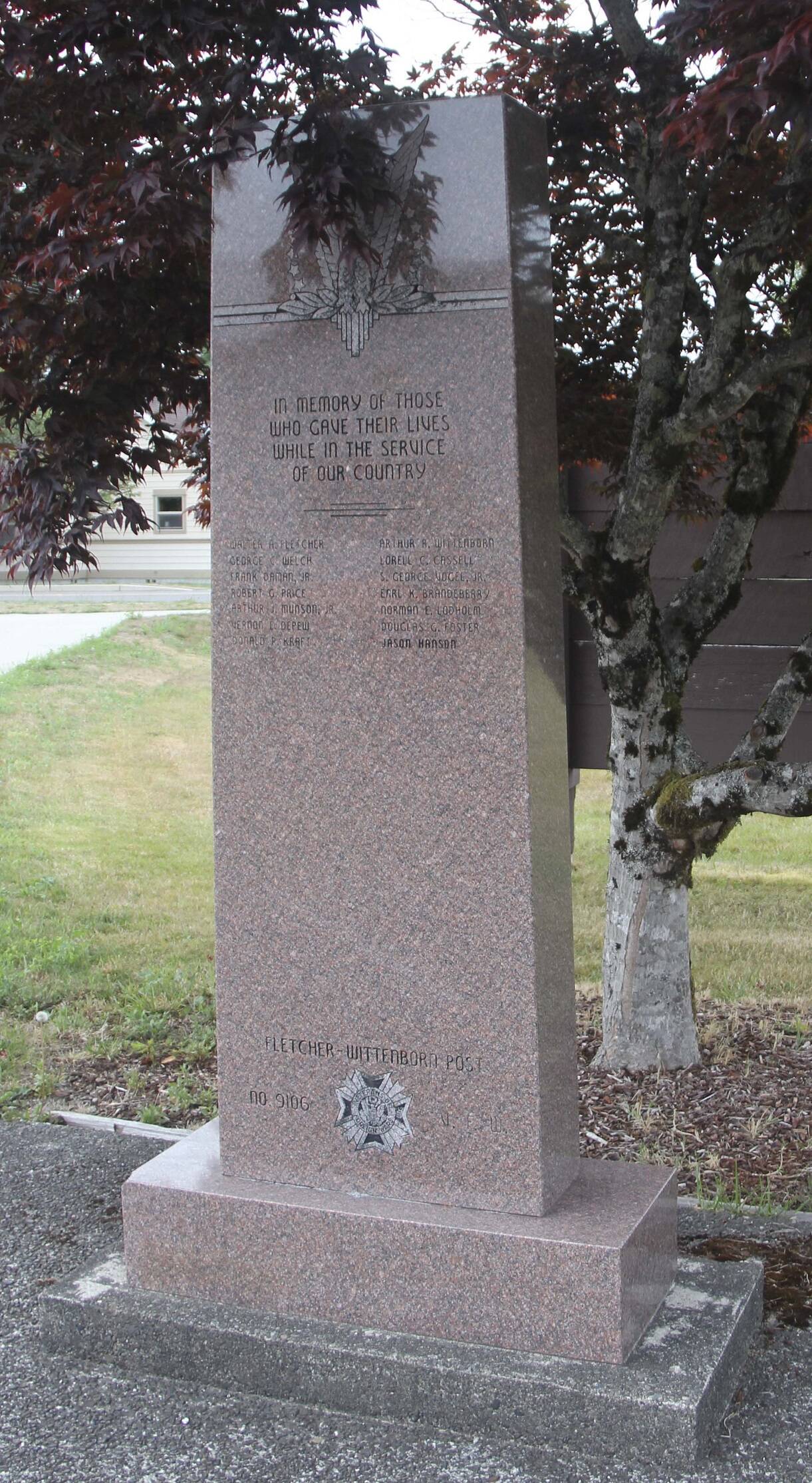 Photo Christi Baron
The monument at Forks City Hall honors the memory of fourteen West End servicemen who gave their lives in service to our country. Their names—Walter Fletcher, Arthur Wittenborn, George Welch, Lorrell Cassell, Frank Daman Jr., S. George Vogel Jr., Robert Price, Earl Brandeberry, Arthur Munson Jr., Norman Lodholm, Vernon Depew, Douglas Foster, Donald Kraft, and Jason Hanson—are etched in remembrance. Dedicated by VFW Post #9106.