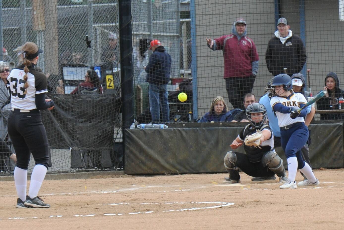 Forks freshman Kat Clark connects for a base hit against the Mountaineers.