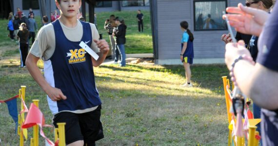 Right, Forks’ Jackson Morrison placed 8th amongst the 50 boys during the cross country race held at the ONRC in Forks. Morrison was the first Forks boy to cross the finish line.