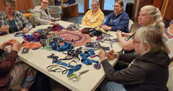 Photo Patsy Brown
Seven new rug makers left the Amish Knot Rag Rug class on Saturday with the start of a one-of-a-kind rug, diverting pounds of colorful strips of tired fast fashion from the landfill. This was part of the Rainforest Council for the Arts Autumn Arts Entertainment event. The class was led by Patsy Brown.