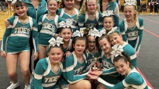 Submitted photo
Coastal Cheer started their season strong with a big first-place finish at the Bison Bonanza! The 13-girl squad is coached by Head Coach Melanie Stonebreaker, along with Assistant Coaches Capriele Celaya and Charlotte Burns. This is the first of six competitions for the team, with their next stop in two weeks at the Carnival Classic.