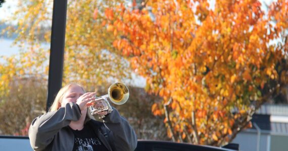 Meg Rasmussen offered taps at the end of the Veterans Day Ceremony at the Forks Transit Center last Tuesday. Photos Christi Baron