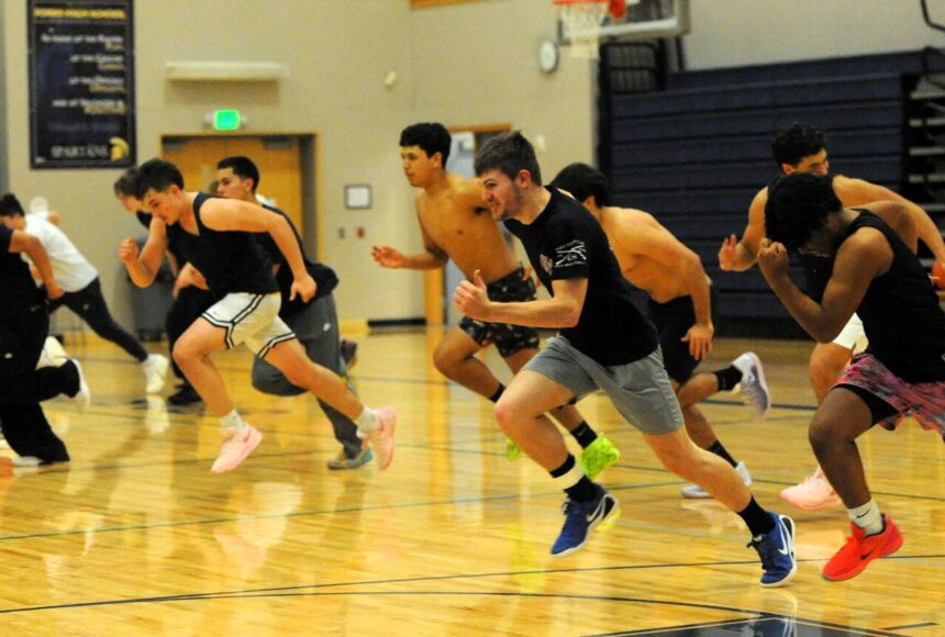 <p>With Forks’ head basketball coach looking on, the Spartans go through drills in preparation for the upcoming season. The Forks JV’s are scheduled to travel to Clallam Bay for a 5:45 game on Monday, Dec l. Forks will travel to Coupeville for a game on Thursday, Dec. 4, then return home for a game with Hoquiam scheduled for Monday, Dec. 8. Schedules are subject to change. </p>
                                <p>Photo by </p>
                                <p>Lonnie Archibald</p>