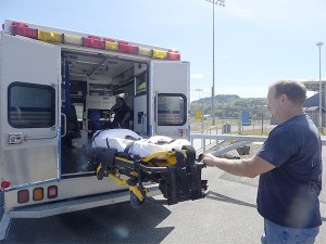 EMS crews demonstrate one of Forks Community Hospital's ambulances.