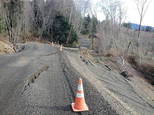 Jefferson County officials are seeking grants to replace a stretch of Undi Road that has been severely damaged by landslides.