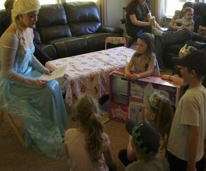 The Ice Queen shares a story with an attentive audience.