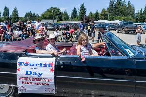 The 2017 Tourists of the Day were Wayne and Dianne Estep from Reno, Nevada. They rode in the parade in a 1965 Cadillac DeVille, owned and driven by Don James. They are visiting Olympic National Park and thought FORKS was the perfect spot to stay for several days. The Forks Chamber of Commerce appreciates them and all the tourists who visit our area. Photo David Youngberg
