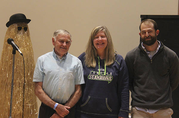 Cousin it, Citizen of the Year Lonnie Archibald, Forks Chamber Director Lissy Andros and Business of the Year award winner Conner Nielson owner of Clear River Construction. Photo Christi Baron