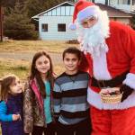 There were lots of opportunities for photos with Santa … some are a little overwhelmed to see the big guy in their neighborhood.