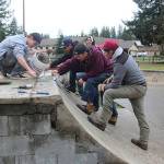 After meeting with City of Forks Public Works Director Paul Hampton Friday morning, this group went to work repairing the vandalized mini-ramp at the skatepark at Tillicum Park. The city donated money which was used to buy a 5-gallon bucket, one bag of concrete and an adhesive which was applied with a caulk gun. The other tools such as trowels, buckets, brooms, air hammer and air compressor were donated by Justin Sane Carner and Josh Gray. Photo Christi Baron