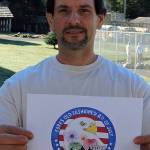 Donald Gilbrech seen here at OCC with his winnng design. Submitted photo