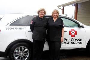 Shelley Van Cleave and Shari Hamilton of Port Angeles Pet Posse. Thanks to a donation Pet Posses latest venture is a pet ambulance/veterinary transport vehicle equiped to transfer animals for medical needs. Photo Christi Baron