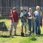 Larry Burtness, Matt Polinqua, Amy Cramer, Buddy Cloy and Roy Morris are happy at end of work day after planting five trees and building five elk fences. Photo Nancy Messmer