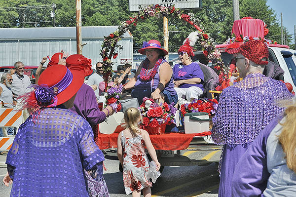 The Clallam Bay-Sekiu Red Hat Society ladies were well in attendance and enjoying the day once again during this Fun Days celebration downtown Clallam Bay during the Grand Parade. Photo by Lonnie Archibald