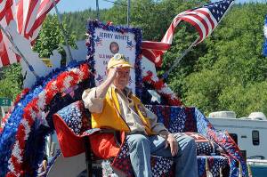 Jerry White, US Marine Corp 1954 - 1959 Okinawa, was honored as the chosen veteran to ride on the Forks Old Fashioned 4th of July Float during the Fun Days Grand Parade. White is also a long time Lions Club member serving 28 years with the group. Photo by Lonnie Archibald