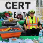 Community                                 Emergency Response Team (CERT) member volunteer Jodi Riker was on hand to share literature on surviving a disaster, candy and cold water on what was a beautiful sunny day on Saturday. Photos Christi Baron