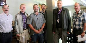 Gathered after the Forks Chamber of Commerce meeting last Wednesday are, from left, District 3 Commissioner Bill Peach, District 2 Commissioner Randy Johnson, Forks Mayor Tim Fletcher, District 1 Commissioner Mark Ozias, Clallam County Administrator Jim Jones and County Transportation Program Manager Rich James. Photo Christi Baron
