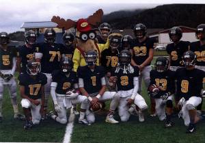 Elroy with the FHS Spartan team before the Homecoming game got underway. Submitted photos