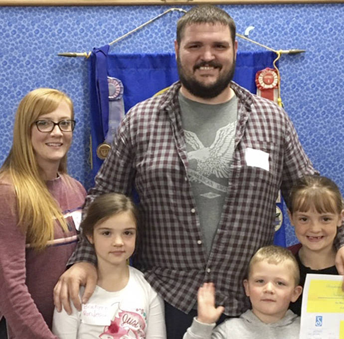 Vern Rondeau received the Diane Demorest Medical Scholarship. This scholarship was created in memory of longtime Forks resident, medical provider, and Soroptimist member, Diane Demorest. It is awarded to someone pursuing a degree or continuing education in the medical field. Pictured with Vern are his wife and children.