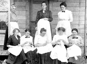 Martha Merchant Maybury standing on the left.