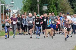 Children, adults, and even a dog participated in the annual Forks 4th of July Fun Run organized by Spartan head basketball coach Rick Gooding to benefit the FHS basketball program. Levi Larson of Forks won the 10K while Adison White of Utah won the 5K race. Photo Rick Gooding