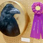 Tony Gutierrez won Best in Show for this painting of a raven on a drum ..Tis the Raven and nothing more …