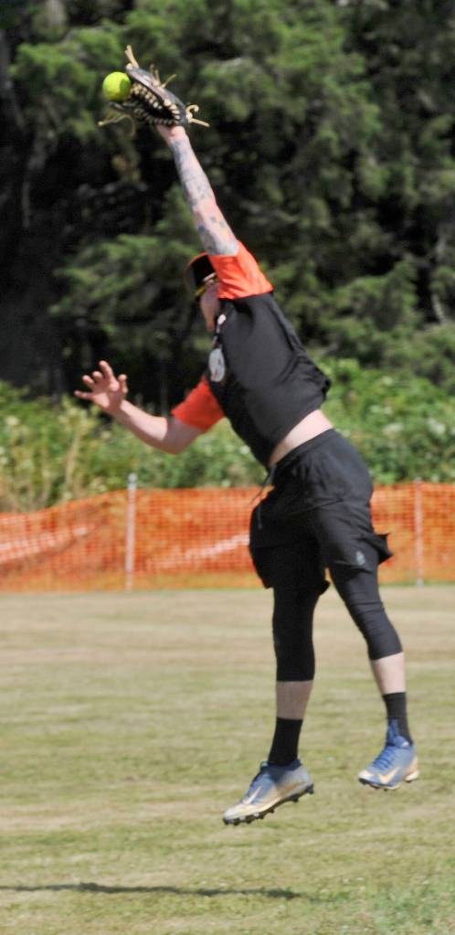 USCG Station Quillayute short Stop Nick Long makes a one-handed catch as the USCG was defeated by the Lady Smith Red Dogs of Vancouver Canada Saturday during the Quileute Days Adult Softball Tournament.