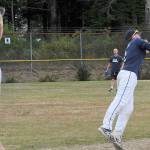 Forks Merchants shortstop Parker Browning makes a catch of a line drive against Hit For Brains Saturday who the Merchants defeated 13-12. Hit For Brains defeated the Merchants Sunday however and went on to win the Fred Orr Tournament.
