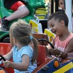 Kendric Riebe age 2 was enjoying the Convoy ride. Photo by Lonnie Archibald