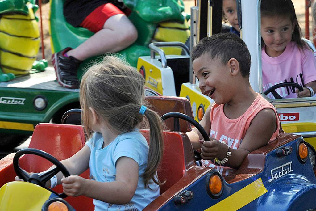 Kendric Riebe age 2 was enjoying the Convoy ride. Photo by Lonnie Archibald