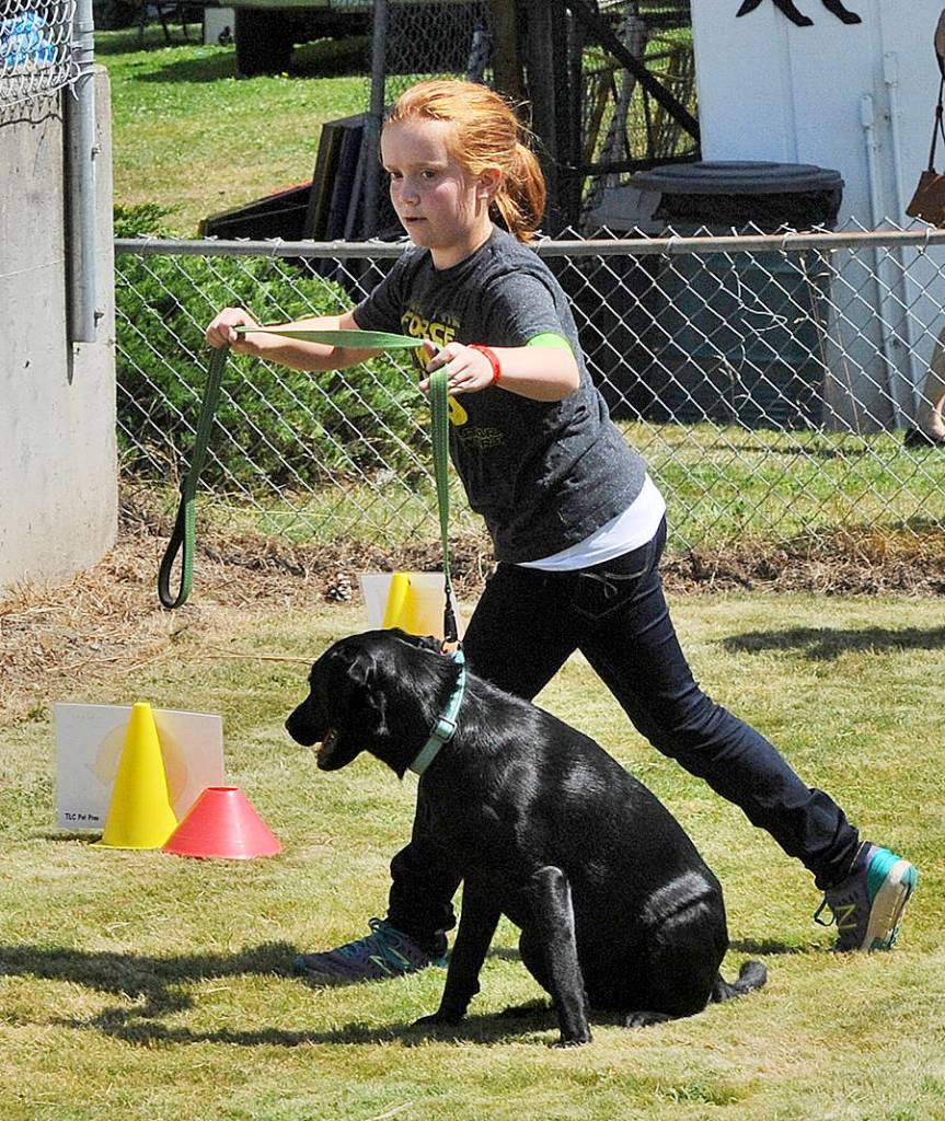 Leilee Earls with Jetta work the course during competition. Photo by Lonnie Archibald