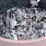 After the chips are burned at the correct temperature to the desired state they are removed from the burner and doused with water. If they burn down to ash they are no longer viable. Photos Christi Baron