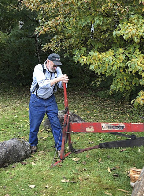 2019 Pioneer Logger Award recipient, Richard Halverson, was seen at the Forks Timber Museum demonstrating how some old-time saws operated. Photo Linda Offutt