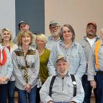 Members of the West End Business and Professional Association gathered for a group photo last Wednesday morning at the Forks Congregational Church after awarding Richard Halverson, seated front, the 2019 Pioneer Logger Award. Photo Lonnie Archibald