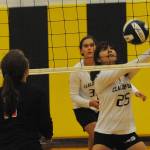 Bruin Vanessa Jimmicom (23) hits.