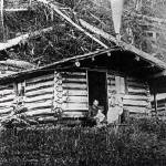 The Hopkins family cabin was located at the foot of the hill now called Bigler. In this photo Mr. and Mrs. Hopkins with baby Cecile. Photos were taken by Elmer Hopkins Georges uncle.