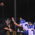 Spartan quarterback Carter Windle releases another pass during the Forks Elma game played at Spartan stadium. The young and injured Spartans gave a senior-laden Elma Eagle team all they could handle as the Spartans played hard up until the final horn losing 27-24. Forks will travel to Hoquiam Friday, Nov. 1 to face the Grizzlies. Photo by Lonnie Archibald