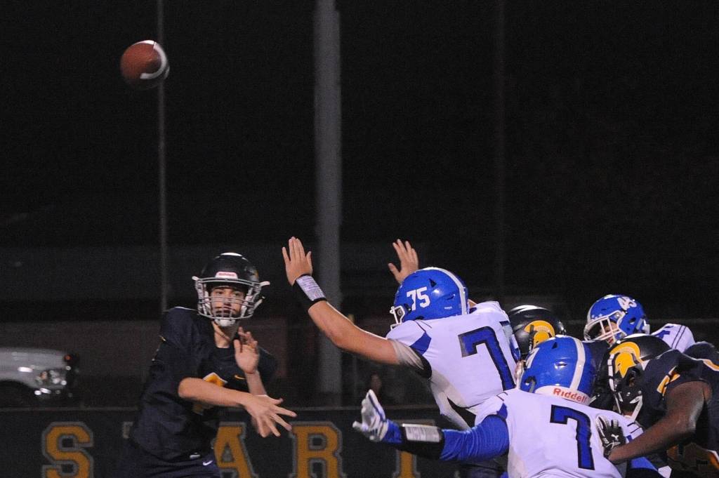 Spartan quarterback Carter Windle releases another pass during the Forks Elma game played at Spartan stadium. The young and injured Spartans gave a senior-laden Elma Eagle team all they could handle as the Spartans played hard up until the final horn losing 27-24. Forks will travel to Hoquiam Friday, Nov. 1 to face the Grizzlies. Photo by Lonnie Archibald