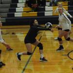 Spartan Myah Rondeau sets while teammates clockwise; Kesia Rowley, Colbie Rancourt, Kadie Wood, Kyra Neal and Emily Adams (2) look on. Forks defeated Tenino 25-17, 25-7, and 25-10 in this Evergreen league contest. Photo by Lonnie Archibald