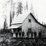 Mr. Garlands cabin on Burnt Mountain. L-R Elmer and Dor Hopkins, Irving Garland, Wash Humphrey, William Hopkins, Mr. Franklin, Foster and Les Sawyer.