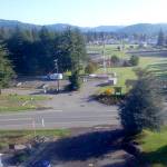 Tillicum Park -now- in this drone photo taken from across Highway 101 shows the sign telling about the Forks fire and it is just about the only thing recognizable. The burned-over hills now covered with trees. Photo Bob McIntyre