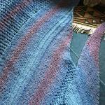 A hand-knit shawlette.
