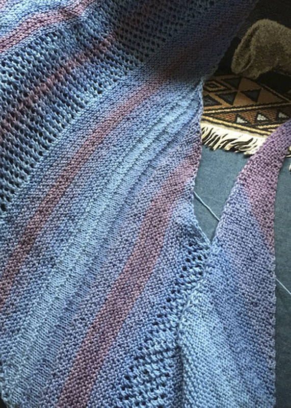 A hand-knit shawlette.