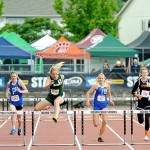 Port Angeles Millie Long, center, wins her heat in the 100-meter hurdles during the 2019 Class 2A State Track Championship. Long went on to win the state championship in the 300-meter hurdles. (Michael Dashiell/Olympic Peninsula News Group file)