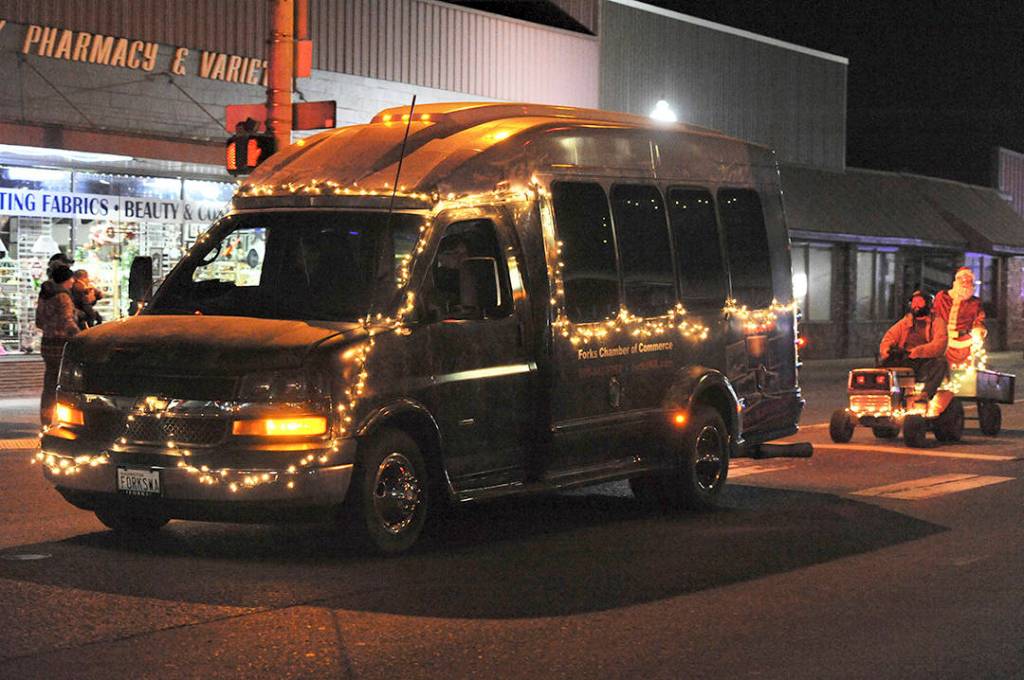 The Forks Chamber of Commerce Logging/Mill Tour van has not seen much activity in 2020 as tours have been canceled due to COVID-19 but driver and decorator Richard Halverson took it for a spin Saturday night. His co-pilot Chamber Director Lissy Andros was bossing him around his words not mine …and she is his boss ..but he is a volunteer so …?