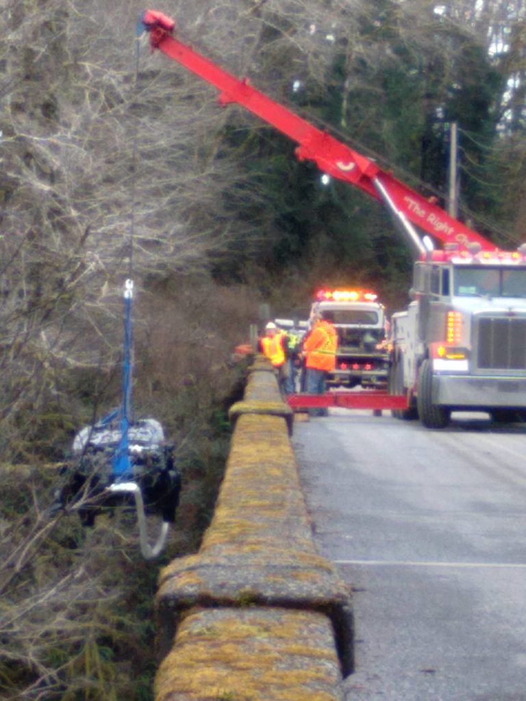 Forks resident Jody Schroeder shared this photo with the Forks Forum of the difficult retrieval of the wrecked vehicle.