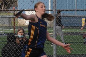 Spartan Myranda Walsh throws the discus. Myranda also ran the leg in the 4x400 relay won by the Spartans.