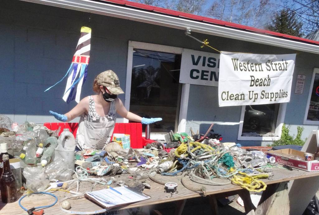 Local Clallam Bay teen volunteer, Riley Person, sorted, counted, and reported thousands of items of marine debris, collected by Pat Higgins and others.