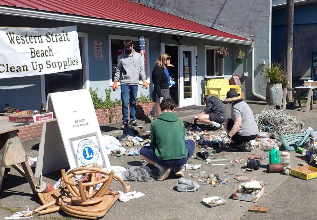 Port Angeles students sort, categorize, count, and report the marine debris they collected.